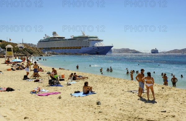 Mykonos, Cyclades, Greece - Voyager of the Seas cruise ship is located in Mykonos Harbour Bay. In