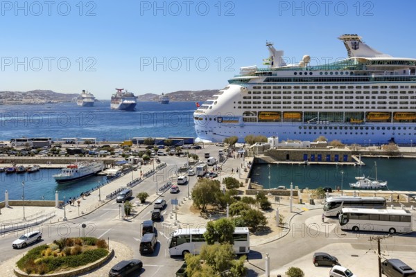 Mykonos, Cyclades, Greece - Mykonos New Port, cruise ship is moored on the quay in the new port in