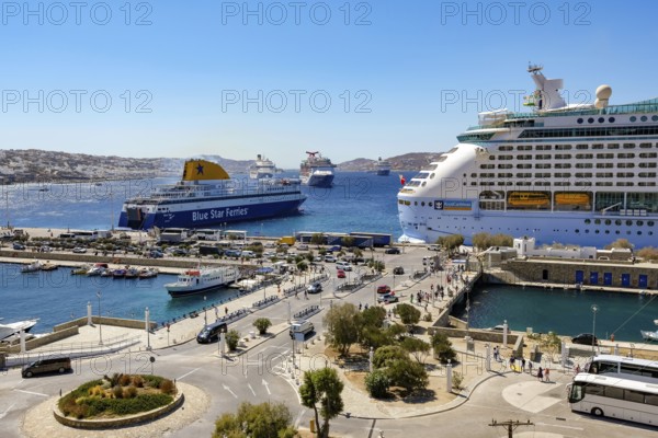 Mykonos, Cyclades, Greece - Mykonos New Port, a Blue Star Ferries ferry and a cruise ship are