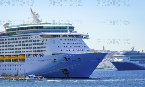 Mykonos, Cyclades, Greece - Voyager of the Seas cruise ship is located in Mykonos New Port. In the