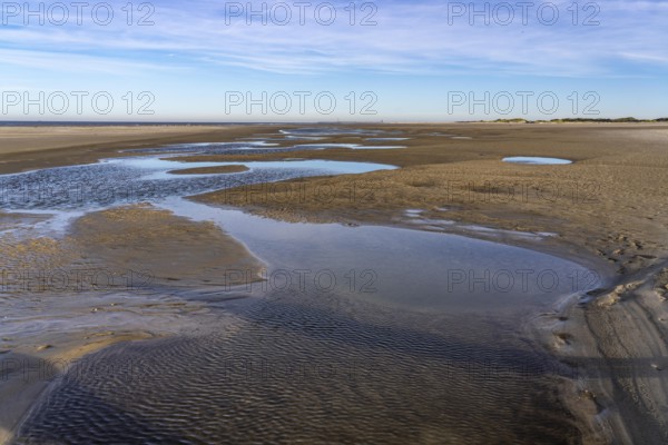 East beach of the East Frisian island of Spiekeroog, at low tide, tidal creek, watercourse at low