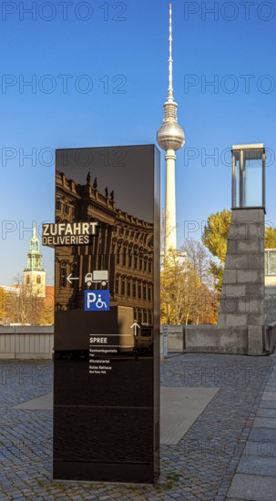 Black information columns with signs and signs on the forecourt of the Humboldt Forum Berlin,