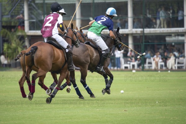 Adolfo Cambiaso known as Poroto from Team Natividad Dolfina hits the ball in the game against Zeta