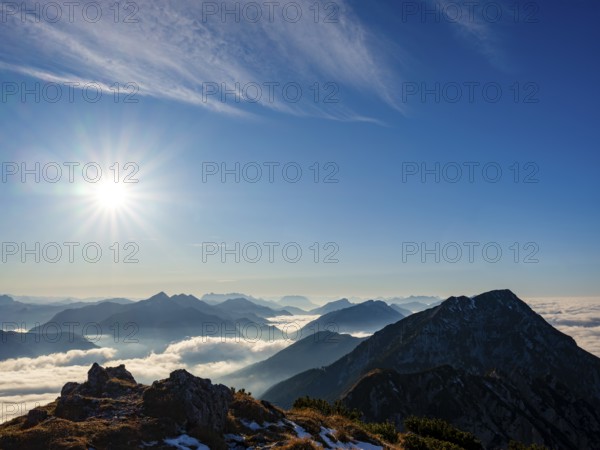 Blue-colored silhouette of mountains, fog in the valley, Hochstaufen, Chiemgau Alps, Upper Bavaria,