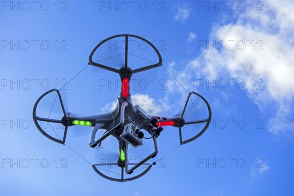 Miniature quadcopter drone, teleoperated unmanned aerial vehicle, UAV equipped with camera for