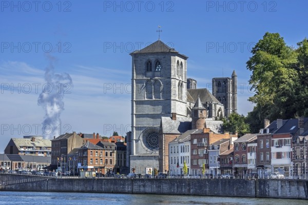 16th century Gothic Notre-Dame collegiate church along the Meuse river in the city Huy, province of