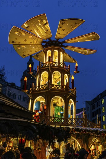 Christmas market with three-story illuminated Christmas pyramid, Rindermarkt, Munich, Upper
