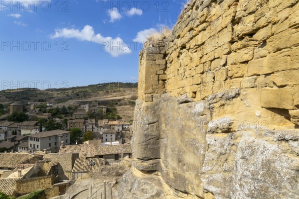 Castle walls built on rock outcrop, medieval village of Uncastillo, Cinco Villas, Zaragoza