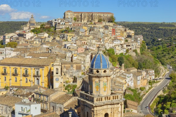 Elevated view of the church of Santa Maria dell'Itria and Ragusa Ibla in the distance, Ragusa Ibla,