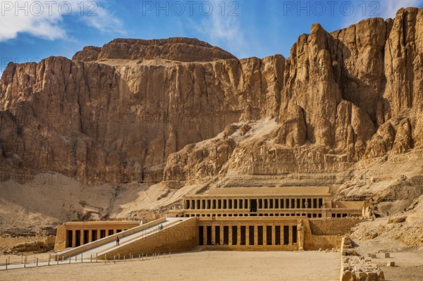Mortuary temple of Pharaoh Hatshepsut - Deir el-Bahari, behind the rock face lies the Valley of the