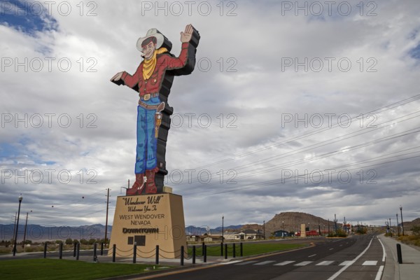 West Wendover, Nevada - Wendover Will, a neon-lit cigarette smoking cowboy, welcomes travelers to