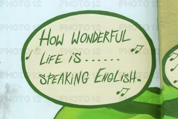 Speech bubble of song 'How Wonderful Life is' promoting English language school college, Zaragoza,