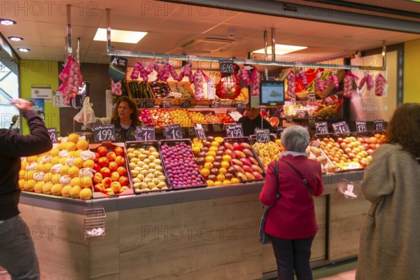 Market stall shop store selling fruit and vegetables inside Mercado Central de Zaragoza, Zaragoza,