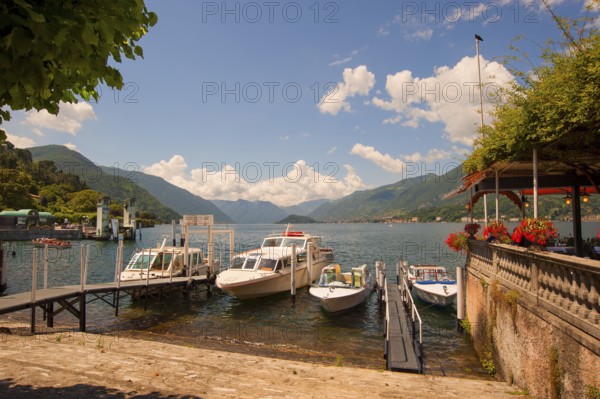 Bellagio, picturesque small town with views of the Alps, boats on Lake Como, Italian Lago di Como,