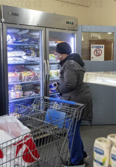 Detroit, Michigan USA - 4 November 2025 - People pick up groceries at the nonprofit Deo Gratias