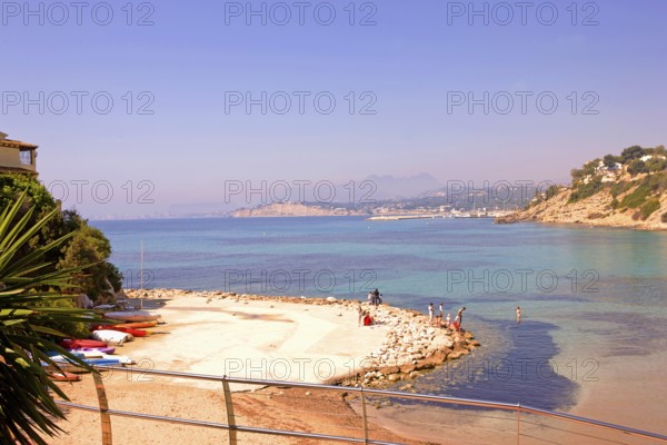 Lonely, shell-shaped beach, Moraira, former fishing village, pearl of the Costa Blanca,