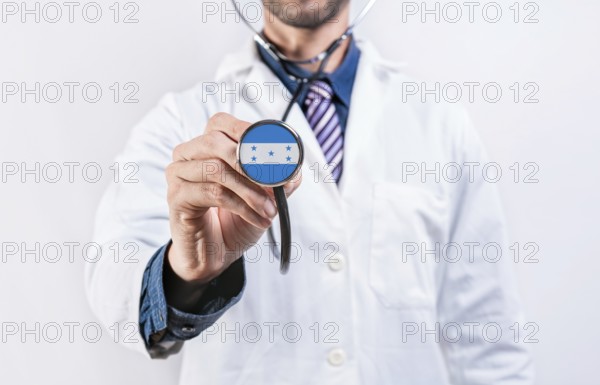 Honduras healthcare system, doctor holding stethoscope. Honduras health and medical insurance