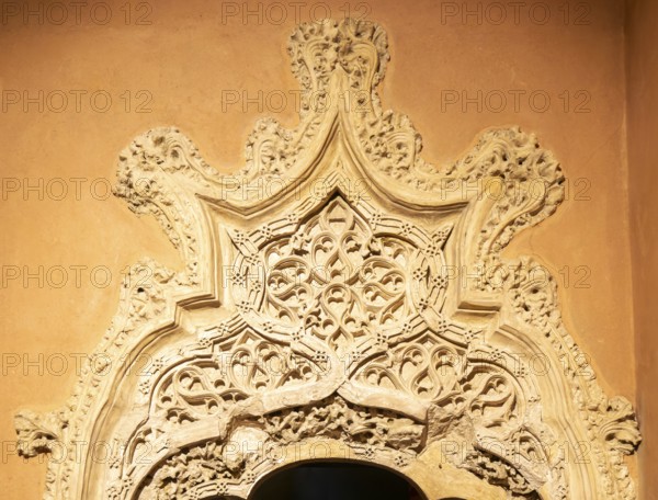 Ornate doorway detail in the Throne Room from time of the Catholic monarchs, Aljafería Palace,