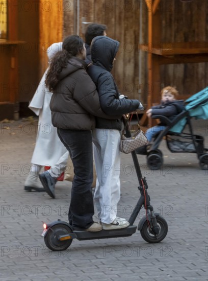 City center, shopping street, Kettwiger Straße pedestrian zone in Essen, 2 young woman on an