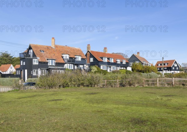 Wooden houses of The Dunes in planned seaside holiday village of Thorpeness, Suffolk, England, UK c