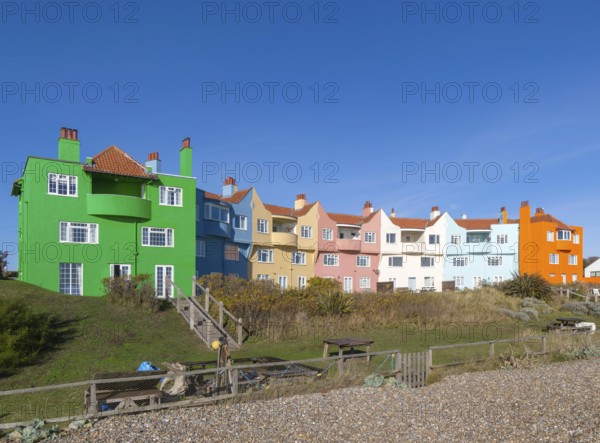 Colourful 1930s seaside houses called The Headlands on the beach at Thorpeness, Suffolk, England,