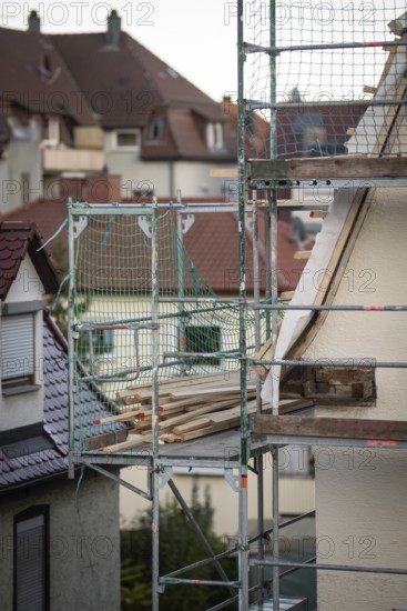 Energetic renovation of an apartment building, renovation of an old building, roof battens on