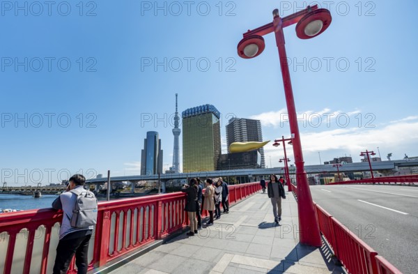 Visitors on the Azuma Bridge, Sumida City Skyline, Sumida City Office, Tokyo Skytree, Asahi Beer