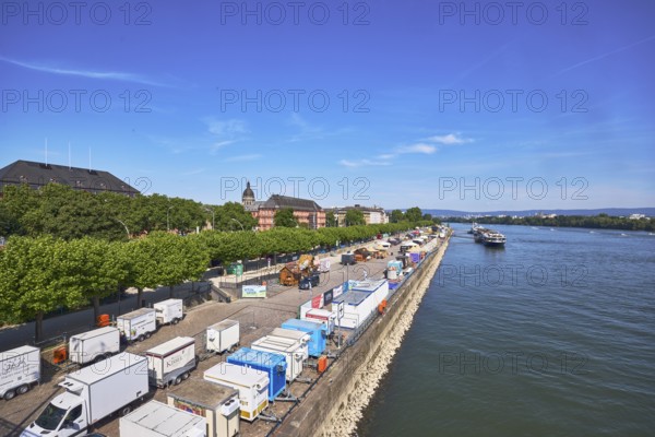 Rhine river, riverbank, sightseeing boat, sales vehicle, general architecture, trees, blue sky,