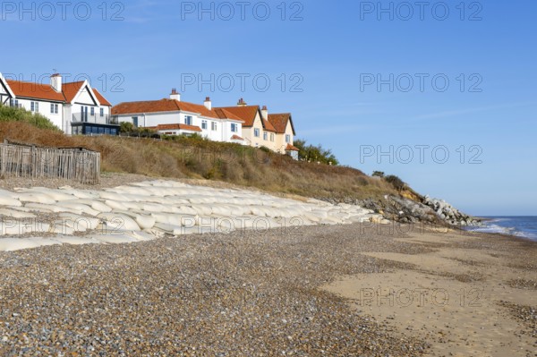 Clifftop houses at risk from coastal erosion, Thorpeness, Suffolk, North Sea coast, England, UK