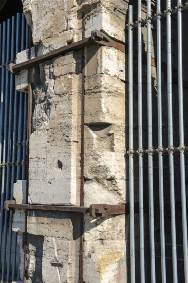Pillar element made of travertine stone from Colosseum with architectural measure used in the
