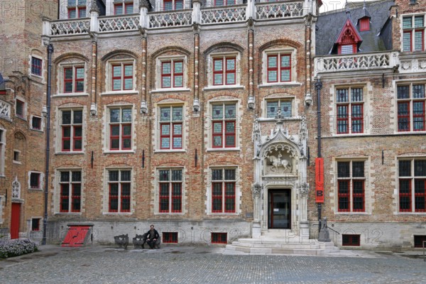 Gruuthusemuseum with equestrian statue of Lodewijk van Gruuthuse above the entrance portal in the