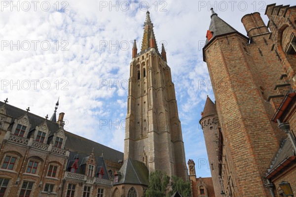 Gruuthusemuseum and mighty tower of the Church of Our Lady, Onze-Lieve-Vrouwekerk, in the historic