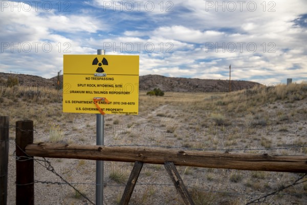 Jeffrey City, Wyoming - 'No Trespassing' signs adorn the perimeter of a former uranium mine and