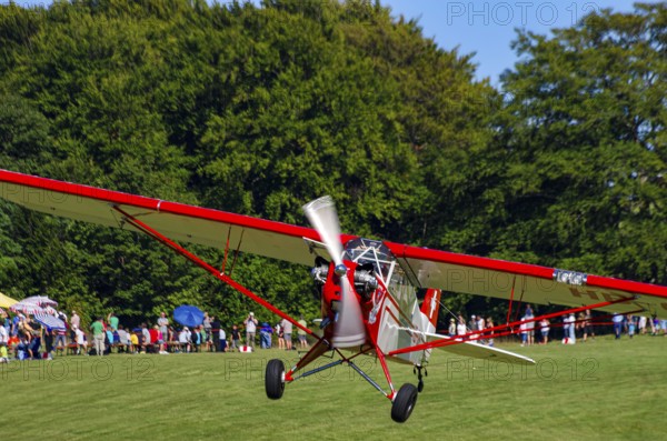A Piper J-3C/L4 Cub light aircraft, HB-OBF registration, during a flight demonstration as part of