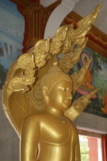 Detail of statue of Buddha in Wat Chalong pilgrimage site, Wat Chaithararam, Phuket province,