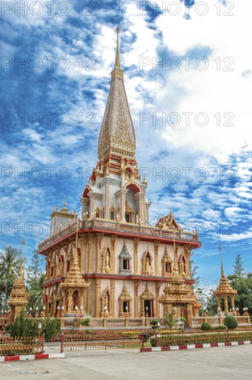 Pagoda with high point pointed tower in Wat Chalong pilgrimage site, Wat Chaithararam, Phuket