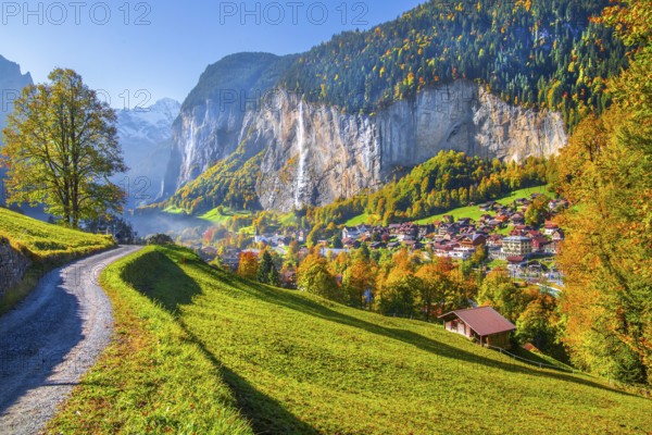 View of town and valley with Staubbach waterfall in autumn, Lauterbrunnen, Bernese Oberland, Canton