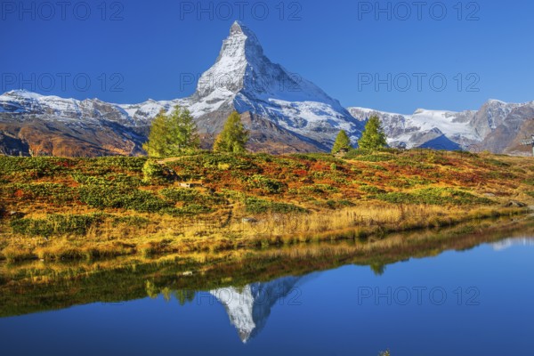 Matterhorn 4478 m with reflection in Leisee on the Sunnegga in autumn, Zermatt, Mattertal, Valais,