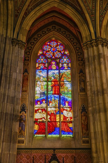 Colourful window in the neo-gothic votive church, Vienna, Austria