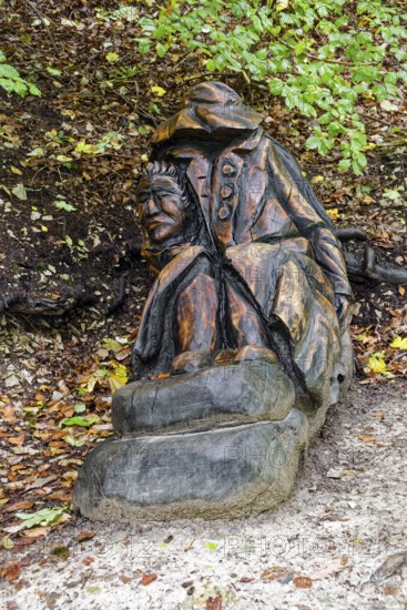 Wooden sculpture Der Haule, Pfullinger Sagenweg, stories and legends, by woodsaw artist Billy