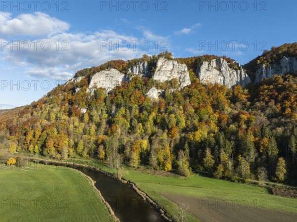 Aerial view of the Upper Danube Valley surrounded by autumn vegetation with the Hausender Peaks