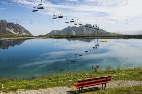 Mountain landscape with reservoir and chairlift, Saloberkopf, Warth, Bregenzerwald, Vorarlberg,