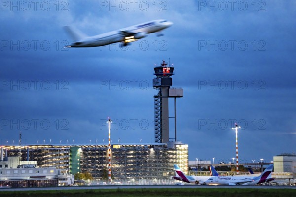 Airplane taking off from Düsseldorf Airport, Air Traffic Control Tower, North Rhine-Westphalia,