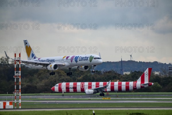 Condor aircraft landing and waiting for takeoff at Düsseldorf Airport, North Rhine-Westphalia,