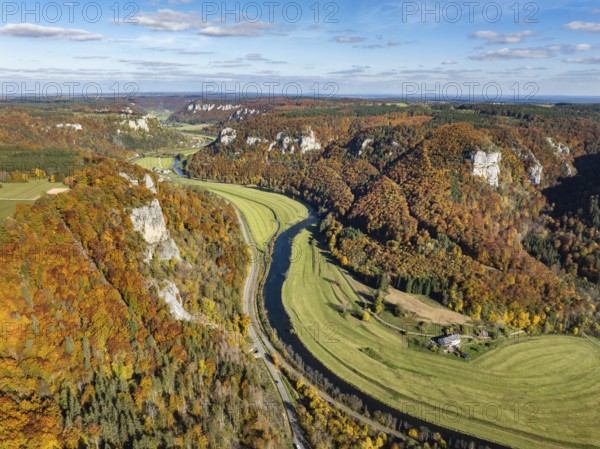 Aerial view of Upper Danube Valley surrounded by autumn vegetation, on the horizon Werenwag Castle,