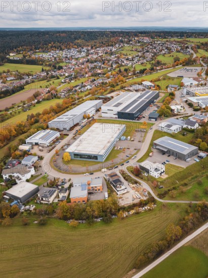 Industrial landscape with autumnal fields and buildings seen from a bird's eye view, Dornstetten,