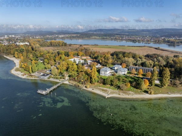 Aerial view of the Mettnau peninsula, surrounded by autumn vegetation, in western Lake Constance