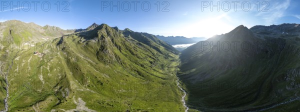 Alpine panorama, aerial view, Lasörlinghütte mountain hut in evening light, mountain landscape with