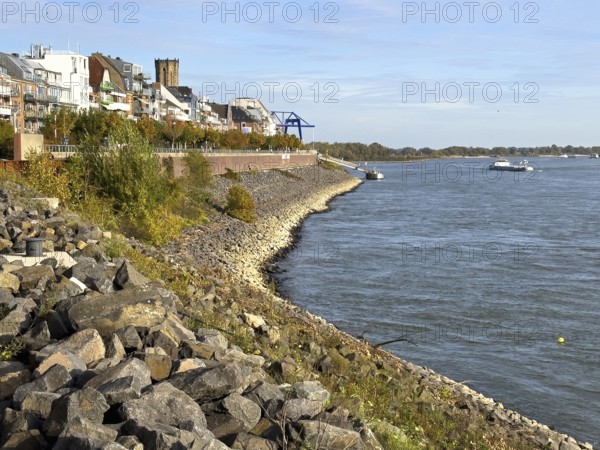 View of Rhine promenade from Emmerich right in front of it against waves and slight low floods