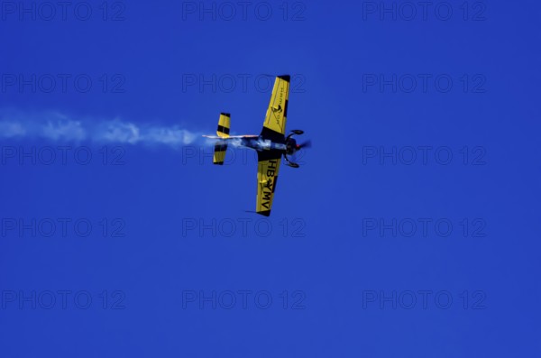 A Votec 351 sport aircraft from the Swiss MSW Aviation AG with registration HB-YMV during a flight